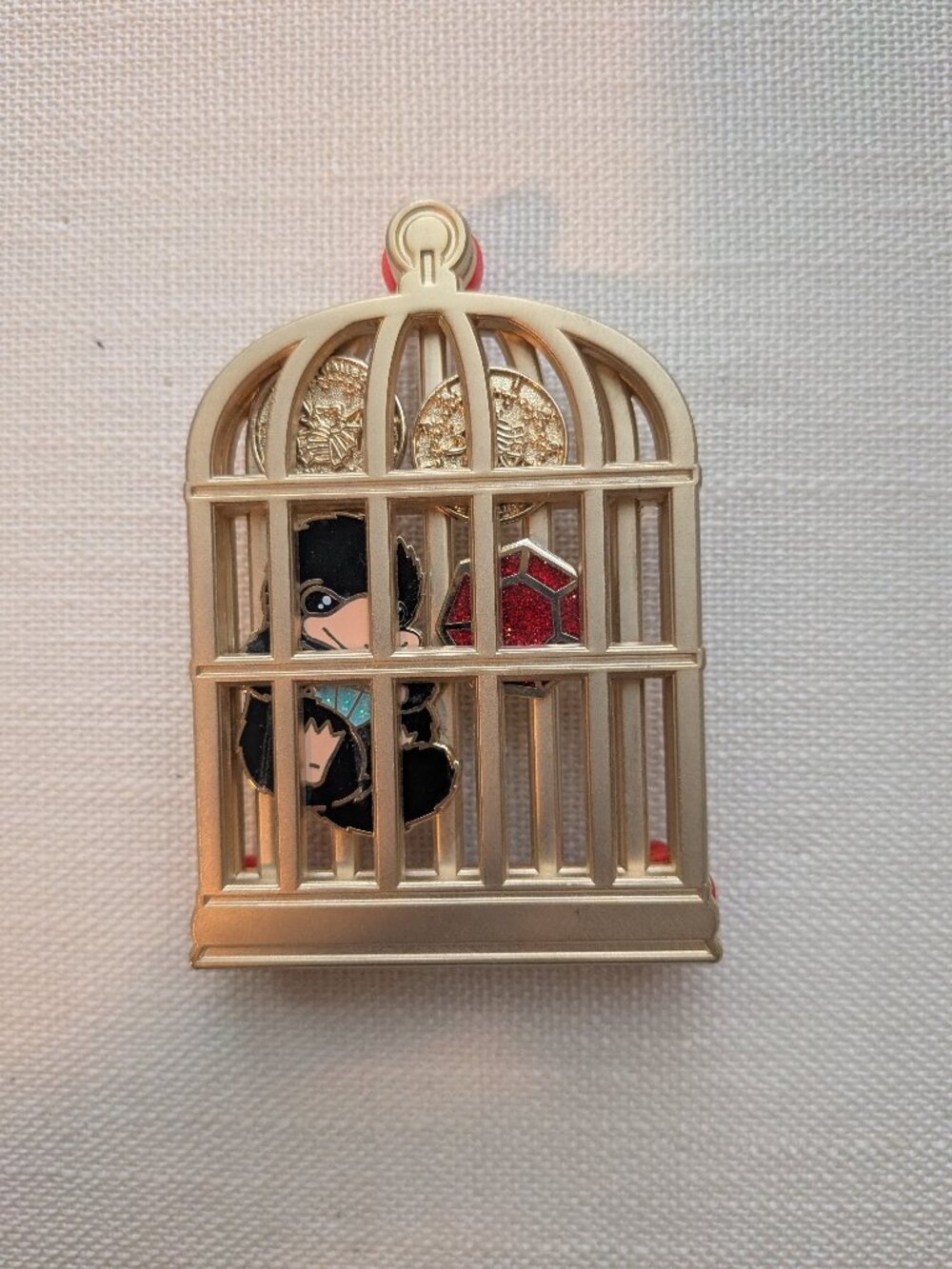 Niffler cage shaker pin